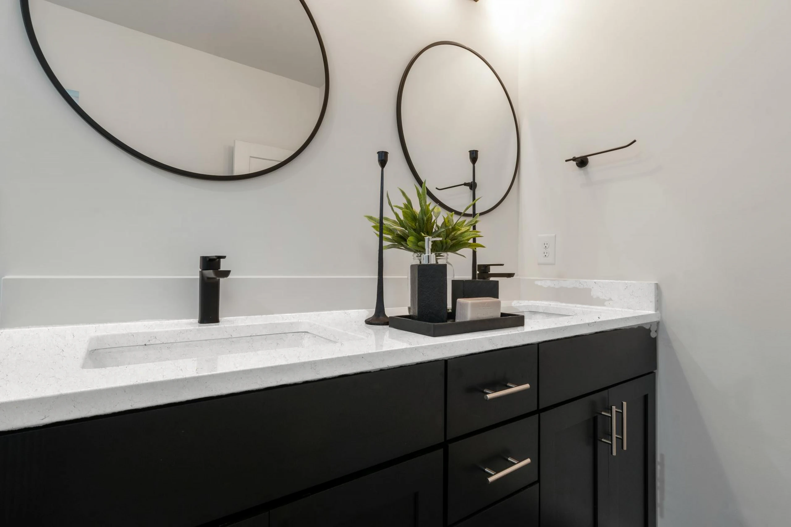 Quartz vanity, dark cabinet — visualised with London Grey quartz