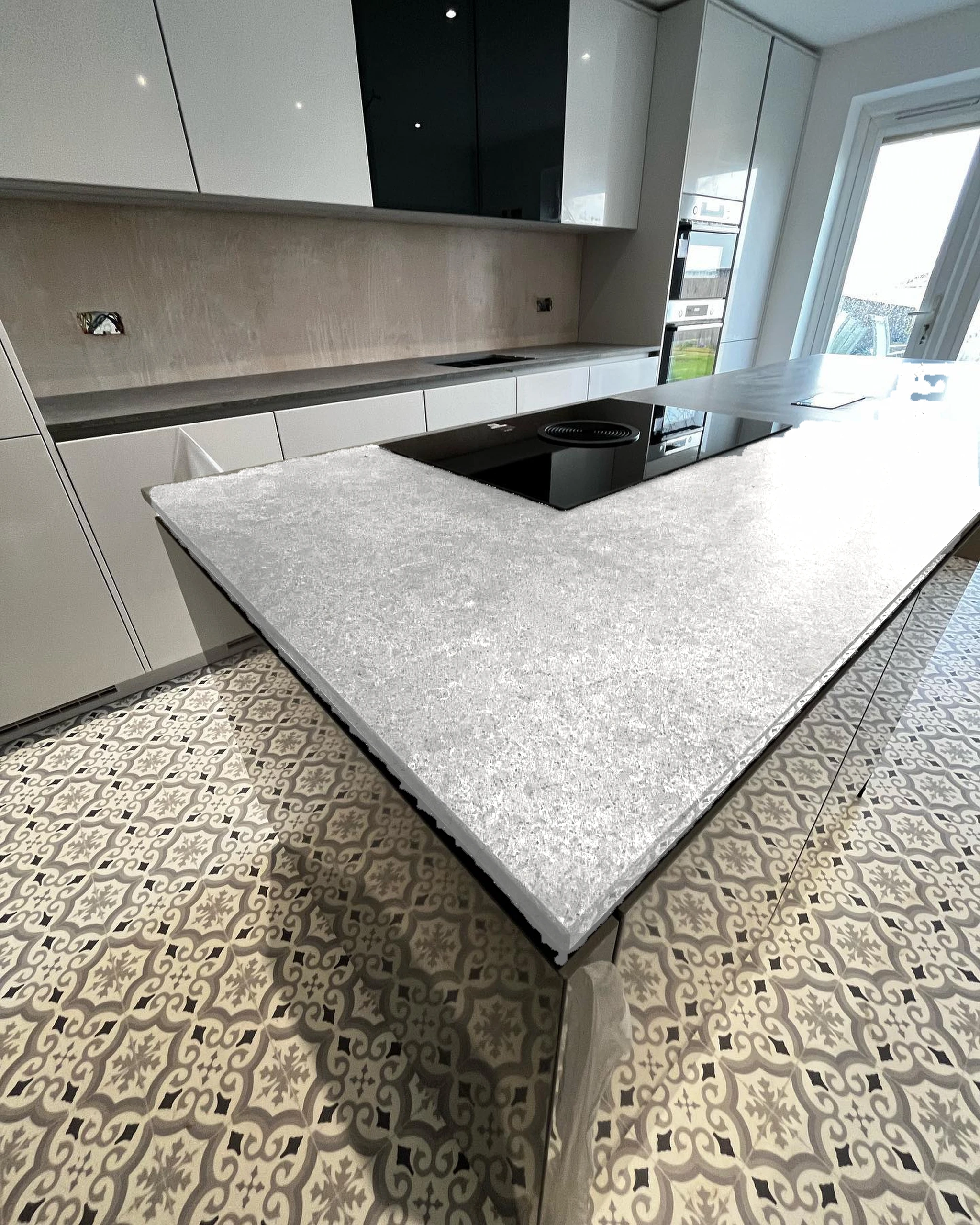 Grey island kitchen — visualised with London Grey quartz
