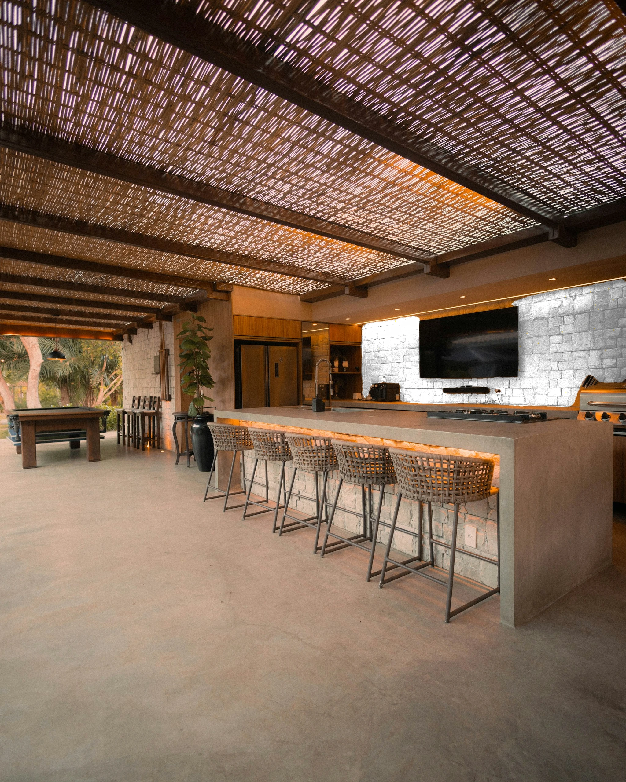 Outdoor kitchen island bar — visualised with London Grey quartz